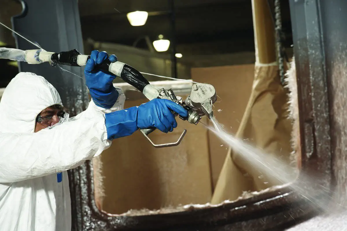 Industrial Manufacturing & Process - Man Spraying